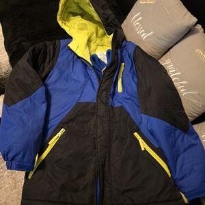 Blue and Black Puffer with Yellow Zippers